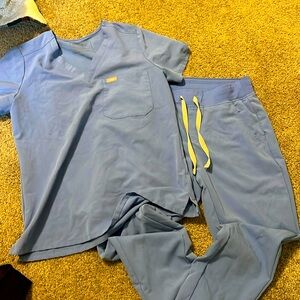 Gently worn dogs scrub set ceil blue S one pocket top and S joggers